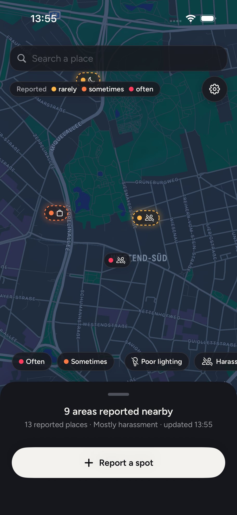 The Blip map at night: soft glows over reported areas, each with a pill naming what people reported there.