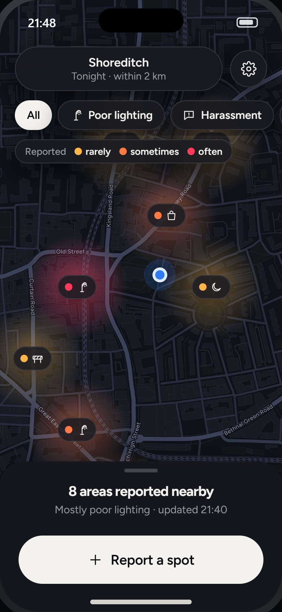 The Blip map at night: soft glows over reported areas, each with a pill naming what people reported there.
